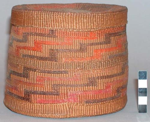 Closed twine rattle lid basket. False embroidery in "shaman's hat" pattern.