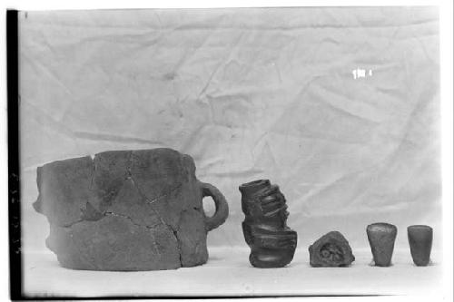 Z 687. {...Figurine ...Mold ...Stone celt ...Stone celt ; not Zacualpa}