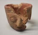 Miniature Pucara polychrome pottery human face effigy bowl