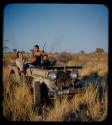 Expedition: Ngani, //Ao and others riding with John Marshall in the expedition Jeep