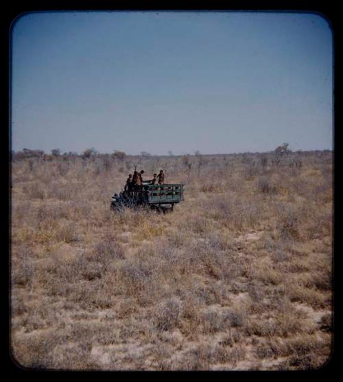 Expedition: Group of people riding in an expedition truck