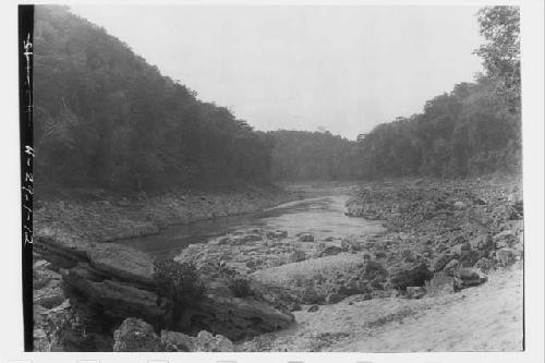 View looking down river from above sacrificial rock