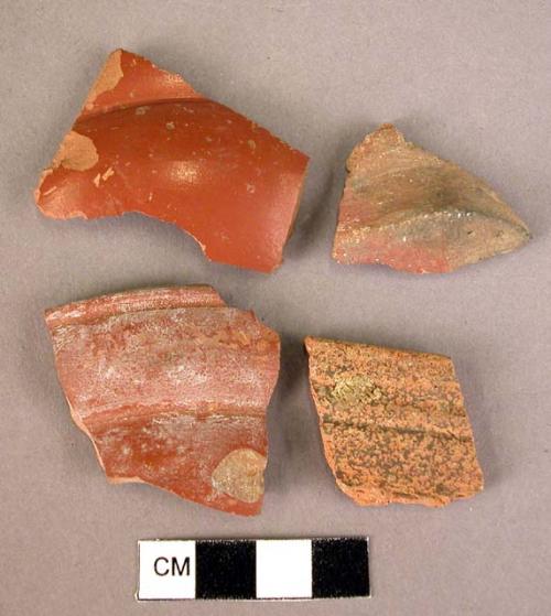 4 potsherds of various red wares