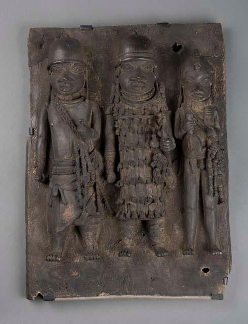 Plaque depicting three men