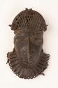 Brass human mask, possible belt ornament