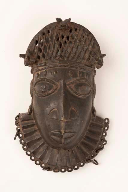 Brass human mask, possible belt ornament