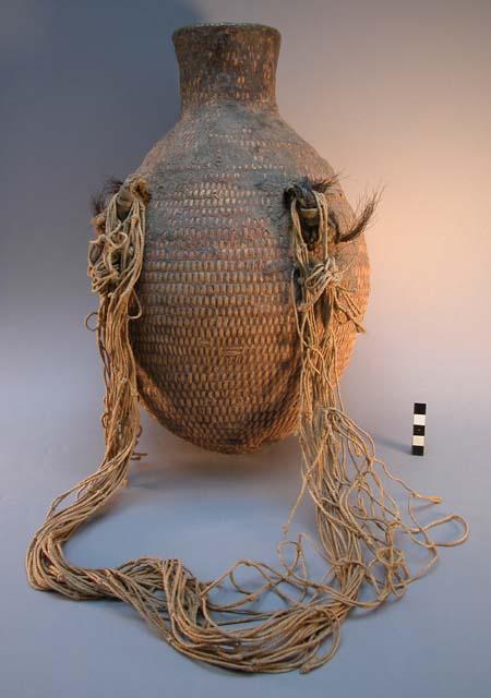 Water jar, wicker work lined with pine gum