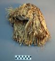 Woman's cap of elaeagnus bark woven with hemp twine.