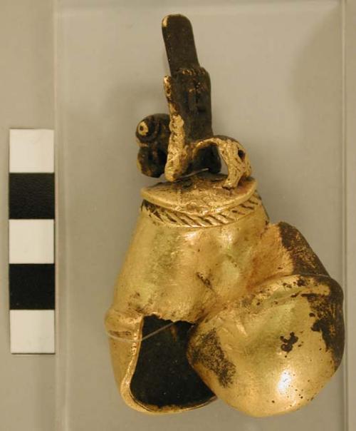 Large gold bell with bird figures at top