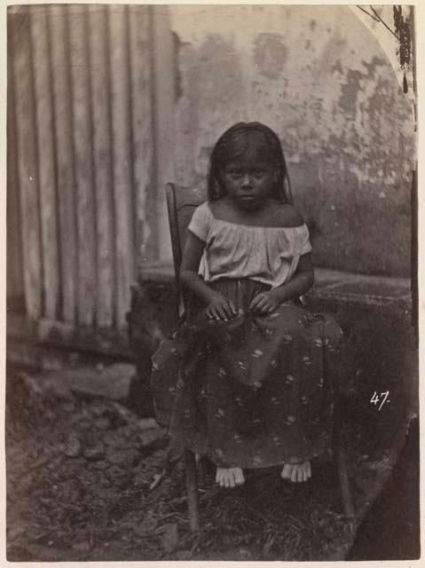 Child sitting on a chair