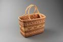 Double-faced plaited and twined rectangular cedar carrying basket with handles