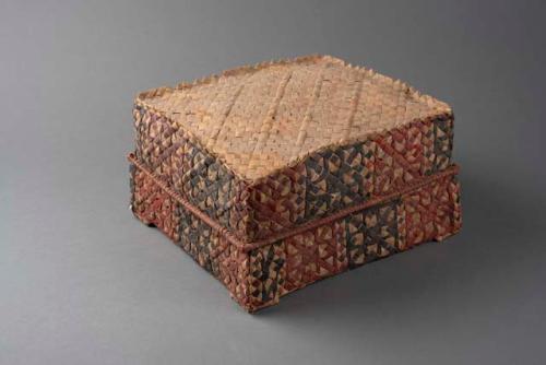 Large baskety box and lid, rectangular. Geometric design of red and +