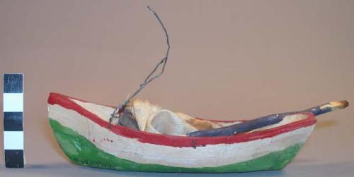 Miniature wooden sailboat for doll called egego - used in ceremony to +