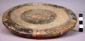 Flat polychrome painted pottery plate