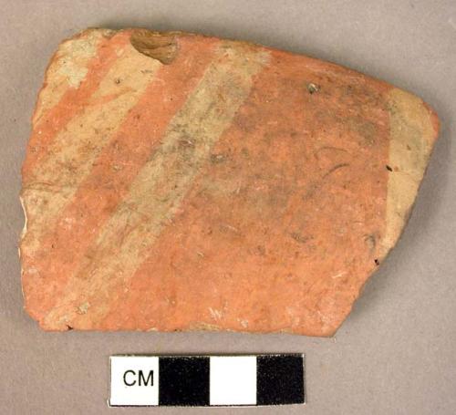 Rim potsherd of white on red painted ware