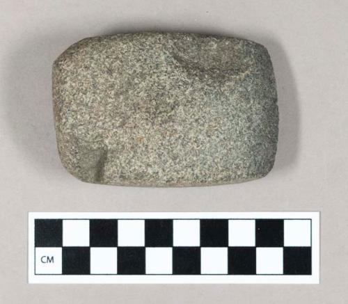 Ground stone axe, broken.