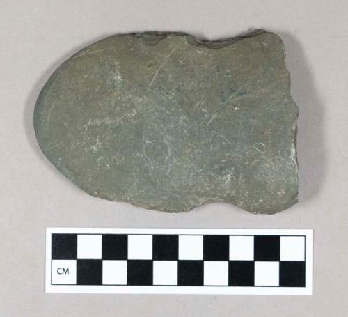 Ground stone axe fragment, grooved.