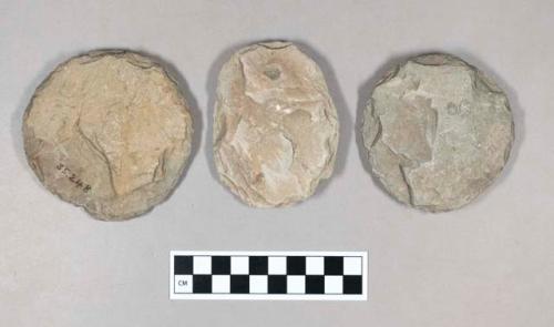 Ground stone discs, rough