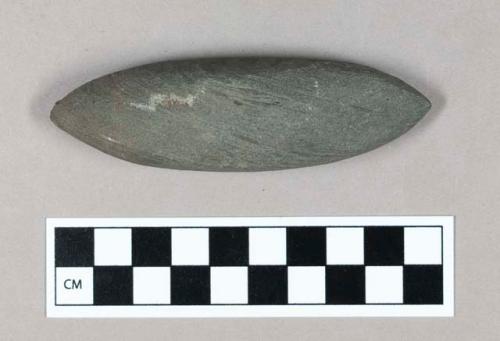 Ground stone atlatl weight