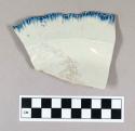 Ceramic, pearlware rim sherd with blue shell edge decoration