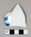 Ceramic, pearlware body sherd with blue transferprint