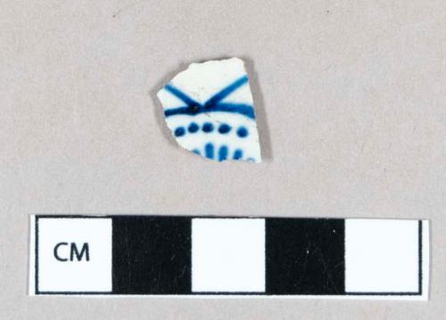 Ceramic, pearlware body sherd with hand painted blue decoration