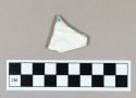 Ceramic, whiteware body sherd with blue transferprint and molded exterior decoration