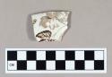 Ceramic, whiteware body sherd with brown transfer print botanical decoration on exterior and interior