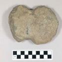 Ground stone tool, notched on each side