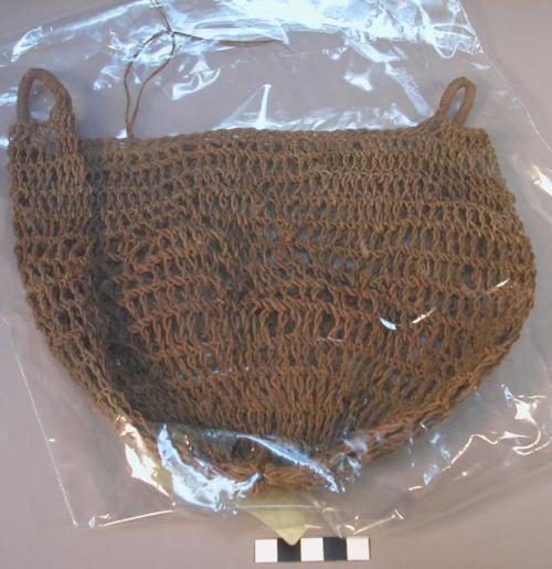 Woven fiber bag, open weave, 2 small fiber handles.