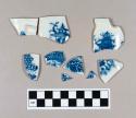 Ceramic, pearlware rim and body sherds, some with handle fragments, some crossmend, blue transferprint landscape on exterior