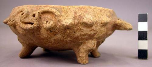 Oval flat pottery bowl with four legs