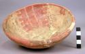 Ceramic, complete bowl, red on buff, mended & reconstructed