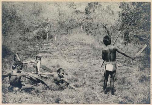 Staged photograph of an ambush by a group of men