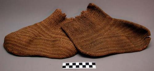 One pair of shoes woven from yellow grass