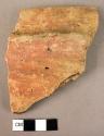 Pottery rim sherd with ledge handle