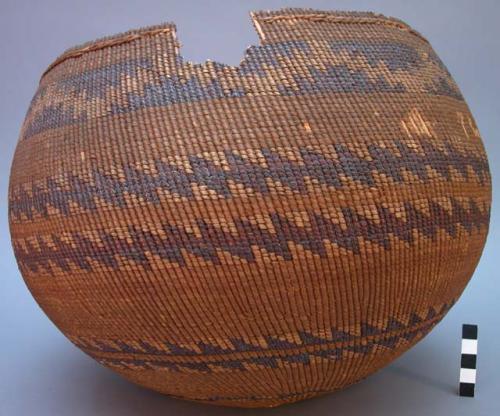 Large round basket with brown design