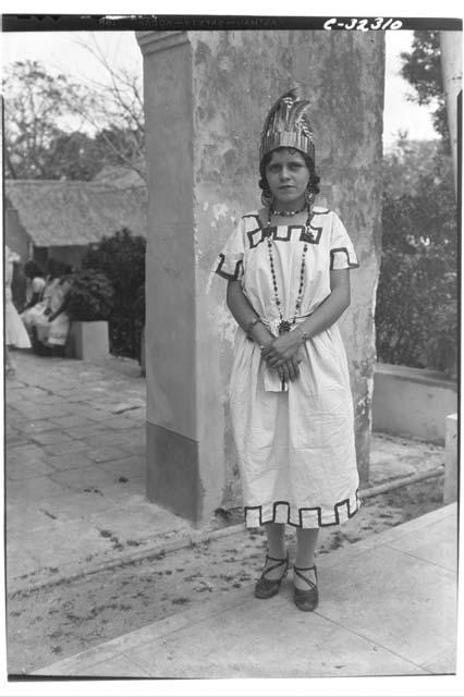 Attendant to Maya queen.