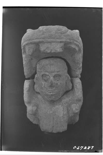 Human head in mouth of serpent from the Temple of Warriors