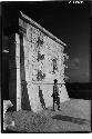 Native Maya boy in front of the Temple of Warriors