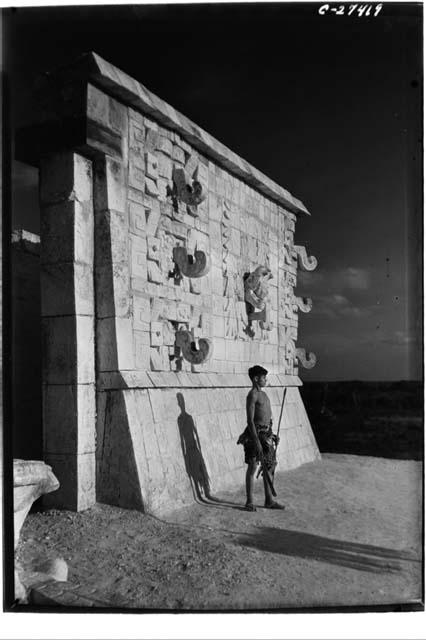 Native Maya boy in front of the Temple of Warriors