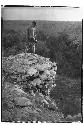 Boy at southwest corner of terrace at Monjas