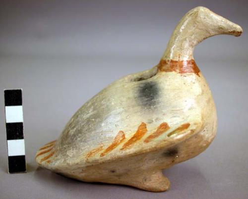 Pottery bird effigy.