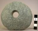 Perforated stone disc
