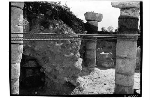 N.Col.showing corner of sculpt/painted dais, before exc.ChacM. right, looking E