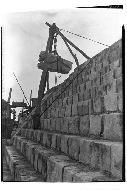 N.W. Colonnade. Showing restoration of serpent head in N. balustrade of stairway