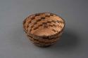 Coiled cattail reed bowl with stepped line motif