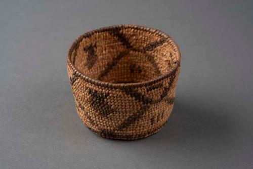 Coiled cattail reed bowl with diamond motif