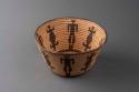 Coiled cattail reed bowl with man and lizard motif