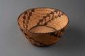 Coiled cattail reed bowl with motif of diagonal bands